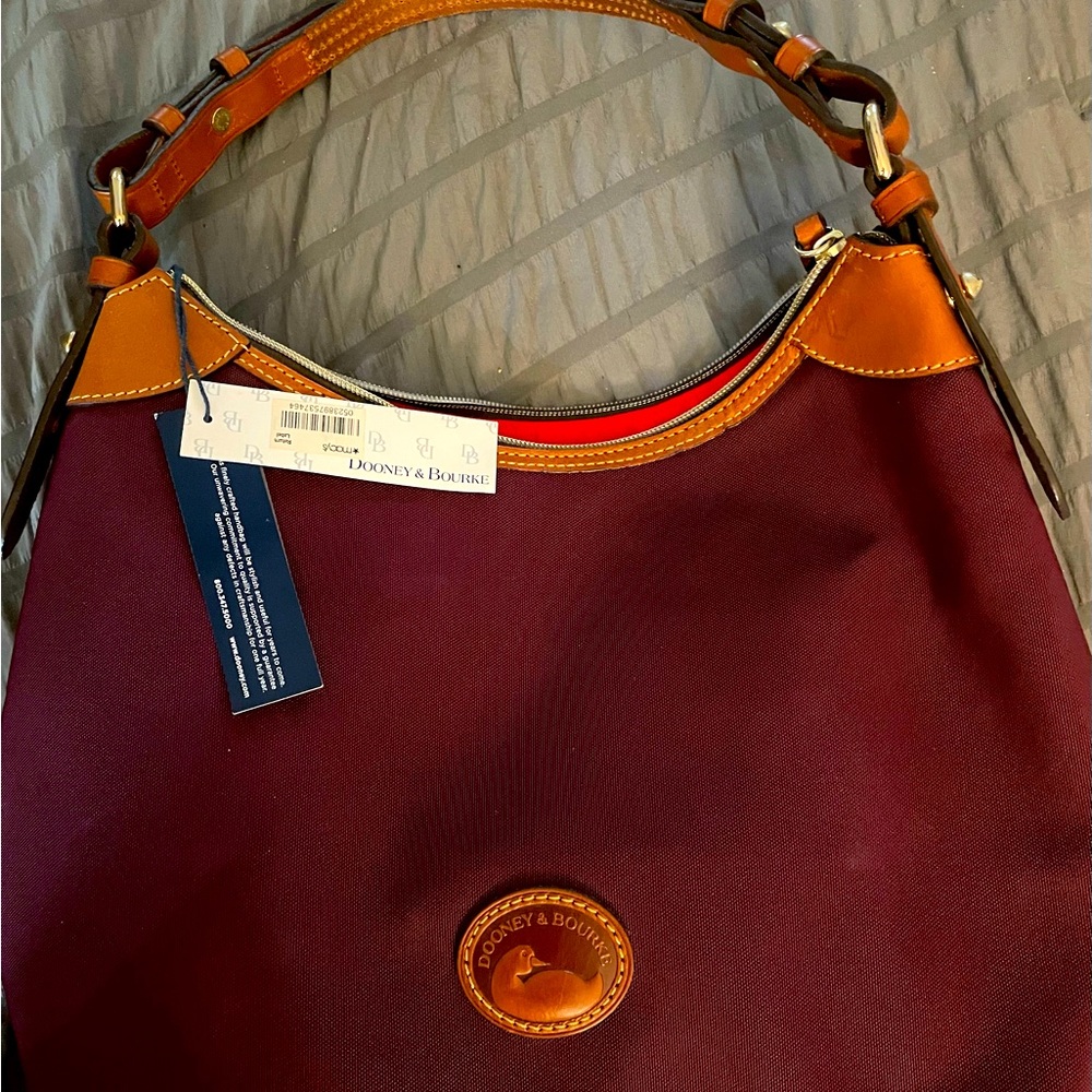 Brand new Dooney and Bourke purse